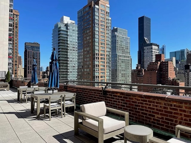 view of patio featuring a view of city