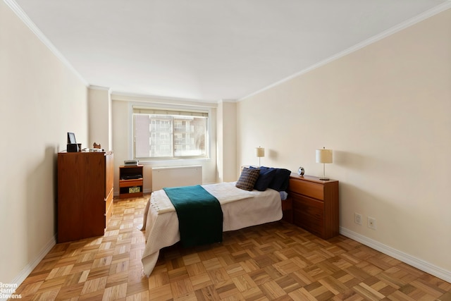 bedroom featuring baseboards and ornamental molding