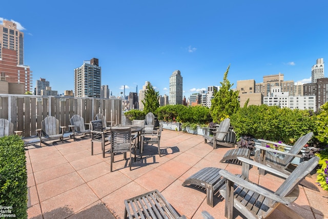 view of patio featuring a skyline view