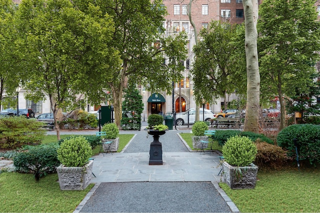 surrounding community with a lawn