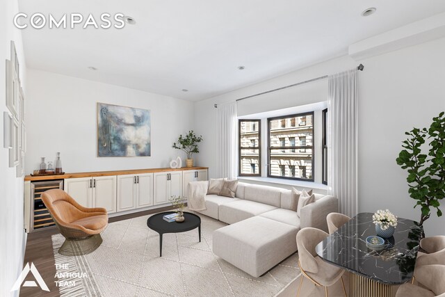 152 E 35th St Unit 3A, New York City, NY 10016 - living room featuring wine cooler and light wood-type flooring