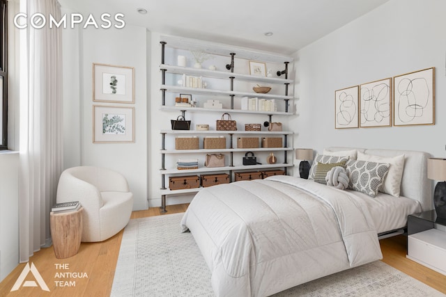 bedroom with light wood-type flooring