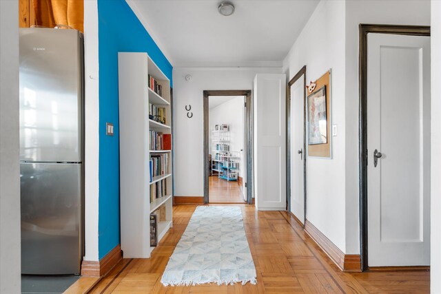 corridor featuring baseboards