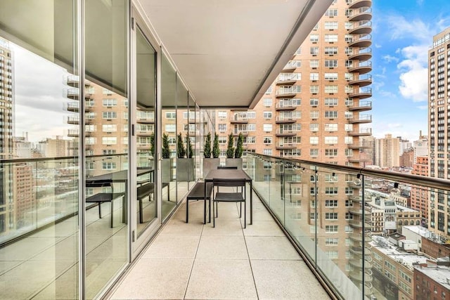 balcony featuring a view of city