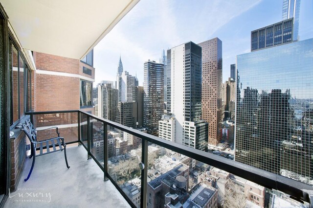 255 E 49th St Unit 31Abf, New York City, NY 10022 - balcony featuring a view of skyline