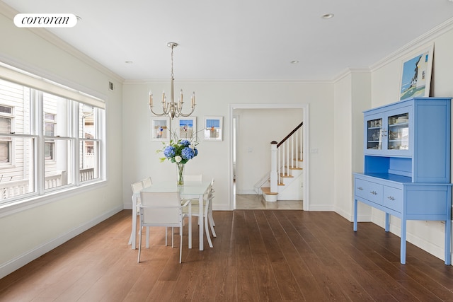 dining space featuring visible vents, crown molding, dark wood finished floors, stairs, and a notable chandelier