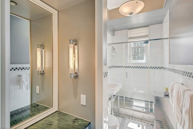 bathroom featuring a stall shower