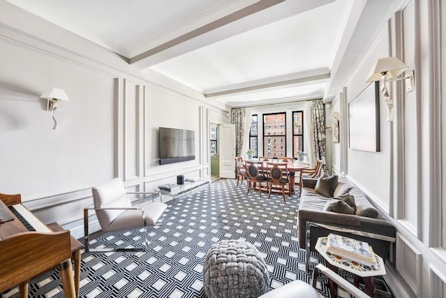 carpeted living room featuring beamed ceiling, baseboards, and ornamental molding