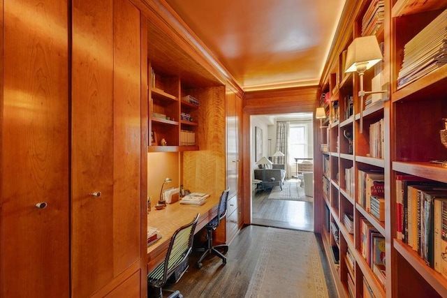 office area featuring wood finished floors and crown molding