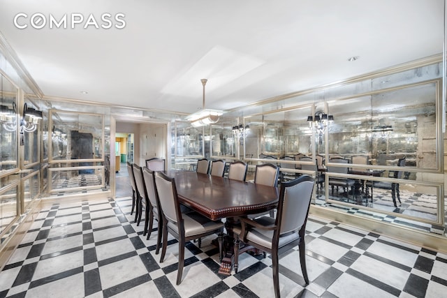 dining area featuring crown molding