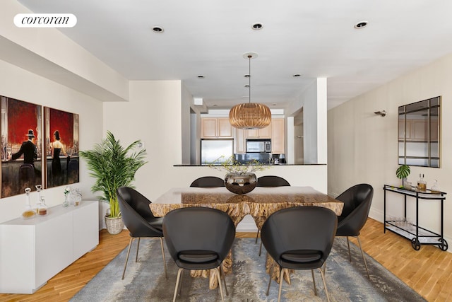 24 W 45th St Unit 7, New York City, NY 10036 - dining room with light wood finished floors and recessed lighting