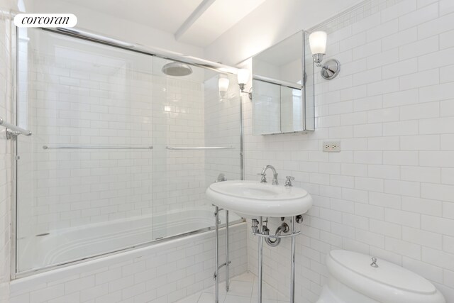 24 W 45th St Unit 7, New York City, NY 10036 - full bath with tiled shower / bath combo and tile walls