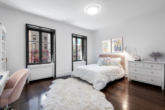 bedroom with wood finished floors
