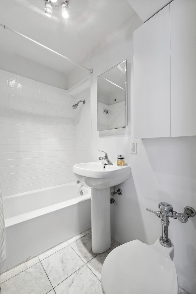 full bath featuring toilet and shower / bathtub combination