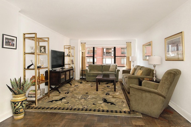 living area featuring crown molding and baseboards