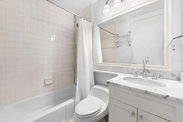 full bathroom with vanity, shower / bath combination with curtain, and toilet