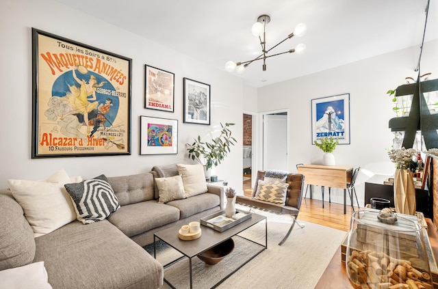 315 E 12th St Unit 22, New York City, NY 10003 - living area with a notable chandelier and wood finished floors