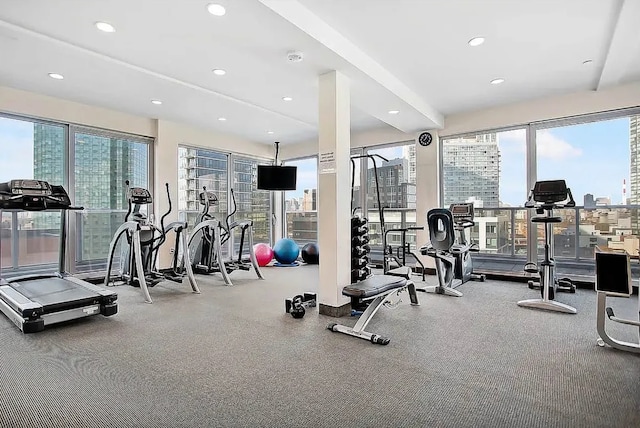 workout area featuring plenty of natural light and recessed lighting