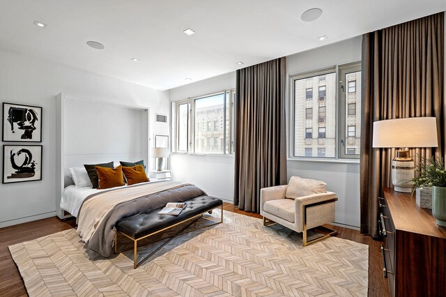 bedroom featuring light wood-style floors