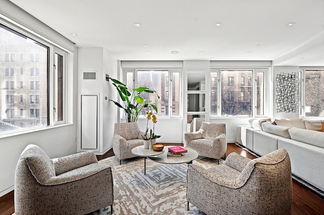 interior space featuring dark wood-style flooring and visible vents