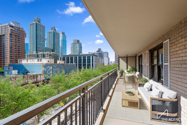 142 W End Ave Unit 6U, New York City, NY 10023 - balcony with a skyline view and an outdoor hangout area