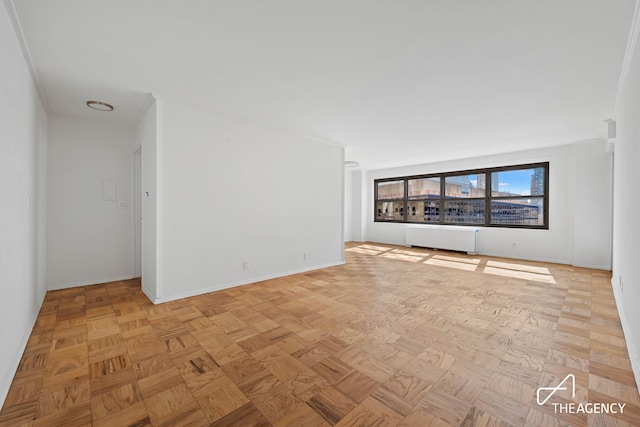142 W End Ave Unit 6U, New York City, NY 10023 - empty room with baseboards and radiator heating unit