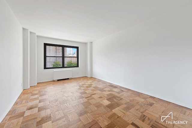 142 W End Ave Unit 6U, New York City, NY 10023 - empty room featuring radiator heating unit and baseboards