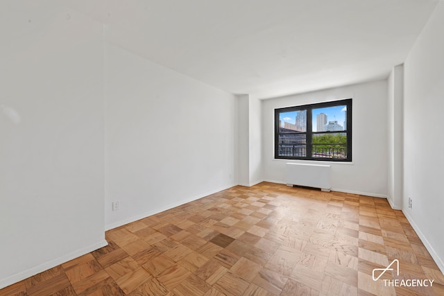 142 W End Ave Unit 6U, New York City, NY 10023 - spare room with radiator heating unit and baseboards
