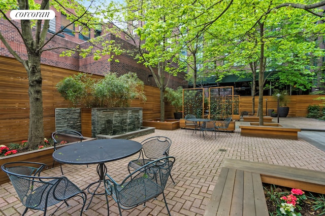 view of patio with fence