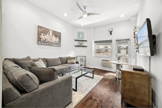 living room featuring recessed lighting, baseboards, dark wood-type flooring, and a ceiling fan