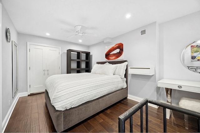 bedroom featuring recessed lighting, visible vents, baseboards, and dark wood finished floors