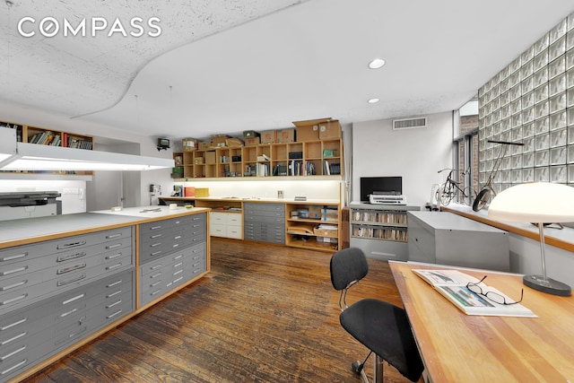 219 E 49th St, New York City, NY 10017 - office with dark wood-style flooring, visible vents, and recessed lighting