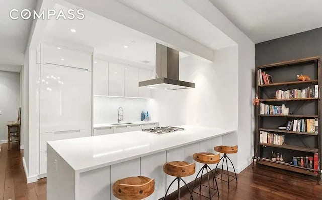 250 W St Unit 3F, New York City, NY 10013 - kitchen with range hood, modern cabinets, a sink, stainless steel gas cooktop, and wood-type flooring