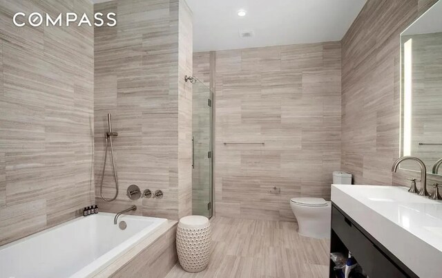 250 W St Unit 3F, New York City, NY 10013 - full bath with tile walls, toilet, and vanity