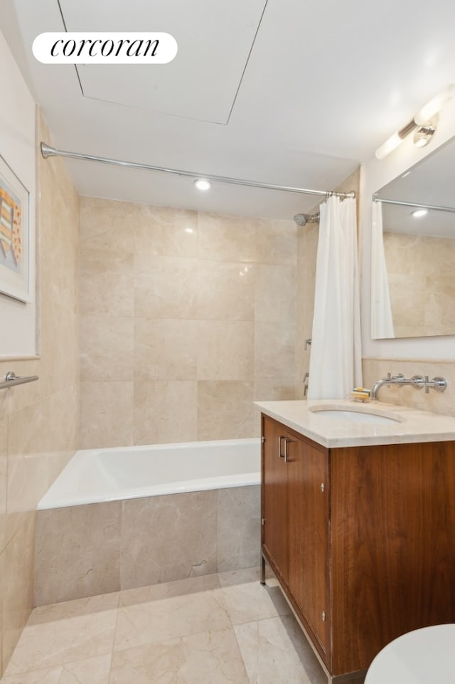 200 E 66th St Unit E306, New York City, NY 10065 - bathroom featuring tiled shower / bath, vanity, and toilet