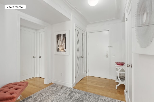 200 E 66th St Unit E306, New York City, NY 10065 - entrance foyer featuring light wood-type flooring and crown molding