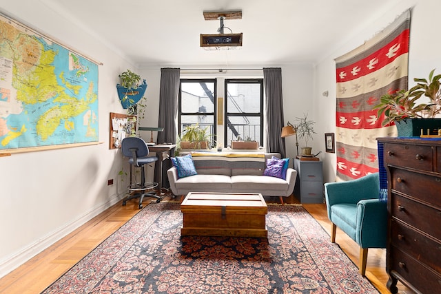 221 E 18th St Unit 6H, New York City, NY 11226 - sitting room featuring baseboards and wood finished floors