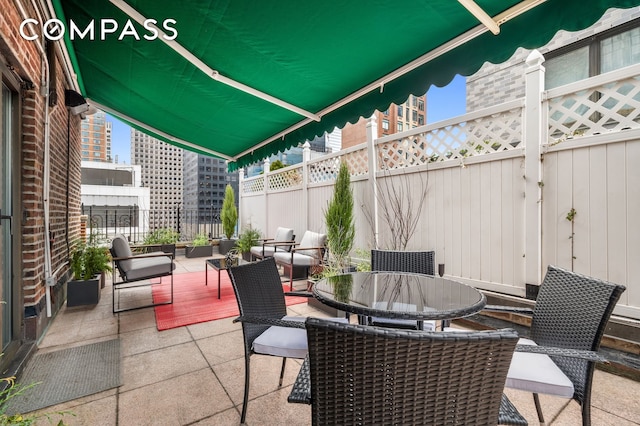 227 E 57th St Unit 18Bf, New York City, NY 10022 - view of patio / terrace with outdoor dining area
