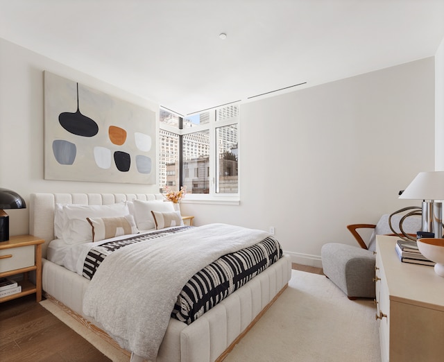 77 Greenwich St Unit 33C, New York City, NY 10006 - bedroom with wood finished floors and baseboards