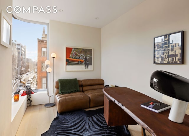 276 Berry St, New York City, NY 11249 - home office with a city view and wood finished floors