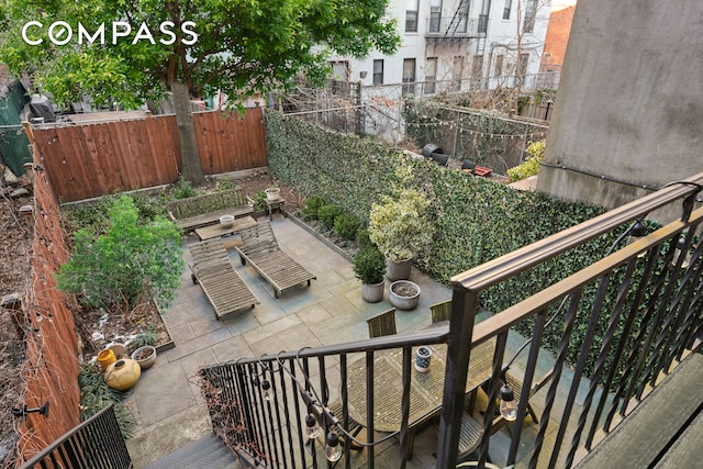 view of patio with a fenced backyard