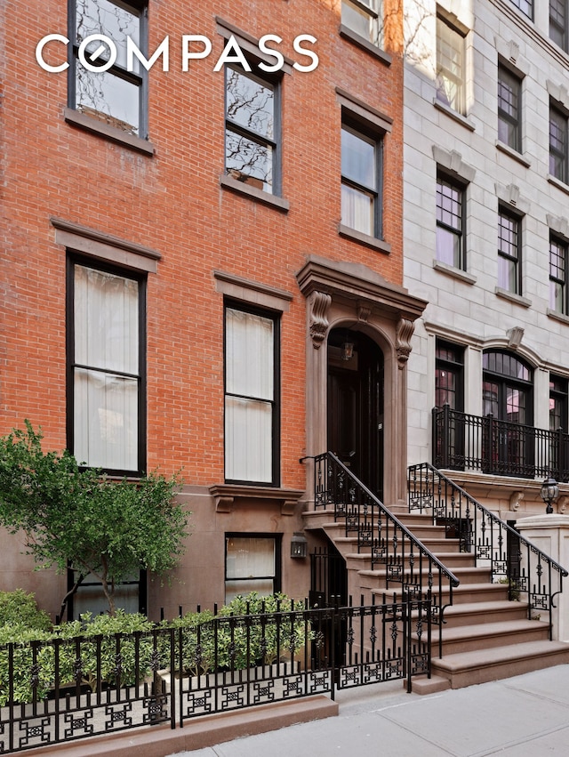 125 W 15th St, New York City, NY 10011 - view of building exterior featuring fence