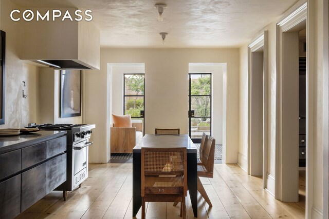 125 W 15th St, New York City, NY 10011 - dining room featuring light wood-style floors