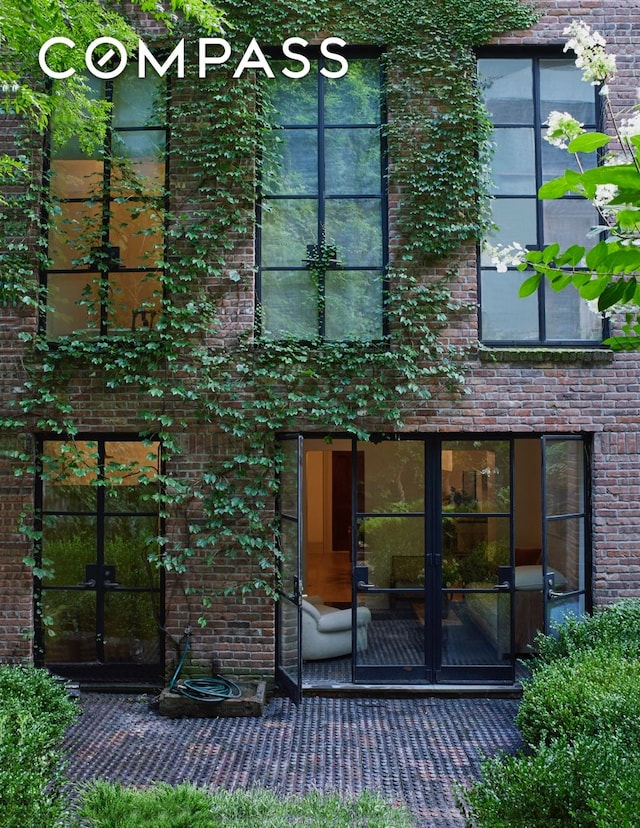 125 W 15th St, New York City, NY 10011 - entrance to property featuring brick siding