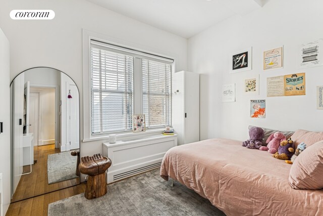 27 W 72nd St Unit 1615, New York City, NY 10023 - bedroom with wood finished floors and multiple windows