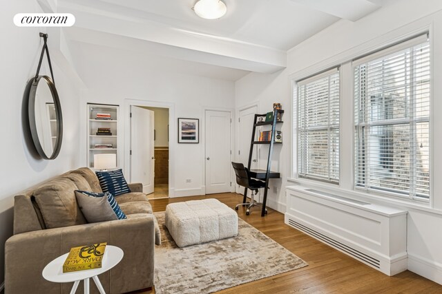27 W 72nd St Unit 1615, New York City, NY 10023 - living area with healthy amount of natural light, wood finished floors, and baseboards
