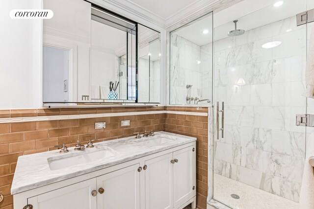 27 W 72nd St Unit 1615, New York City, NY 10023 - full bath with tile walls, a marble finish shower, ornamental molding, and double vanity