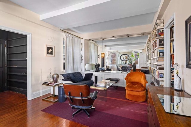 108 E 66th St Unit 9A, New York City, NY 10065 - living area with wood finished floors and baseboards