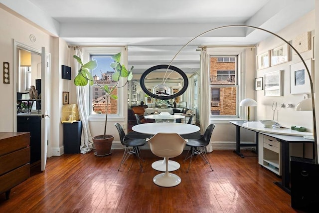 108 E 66th St Unit 9A, New York City, NY 10065 - dining room featuring wood-type flooring and baseboards