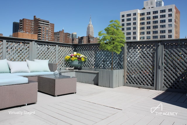 411 W 21st St Unit 3Flr, New York City, NY 10011 - deck featuring outdoor lounge area and a view of skyline